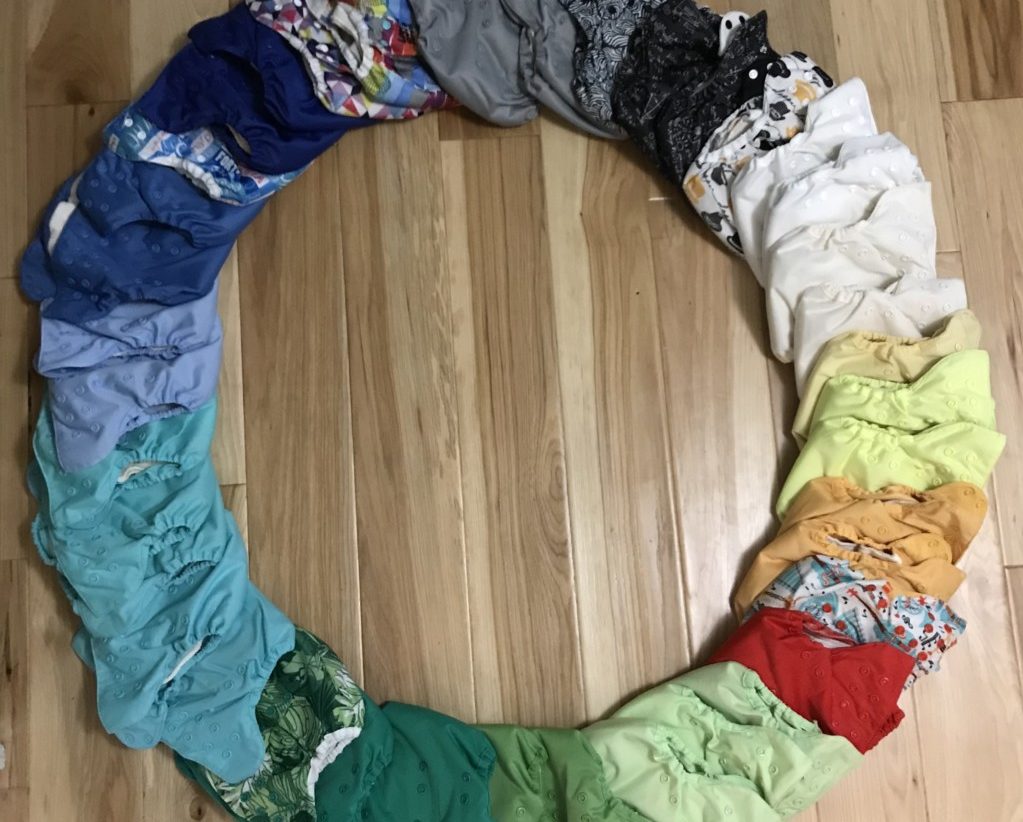 Cloth diapers arranged in color order, in a circle
